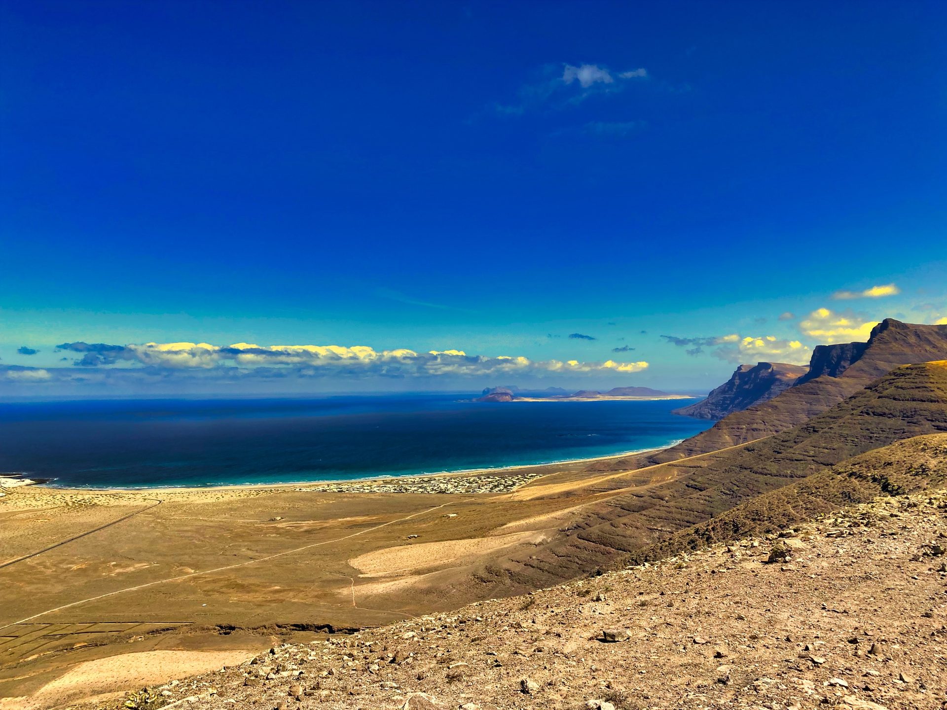 View of Famara beach and the Risco cliffs