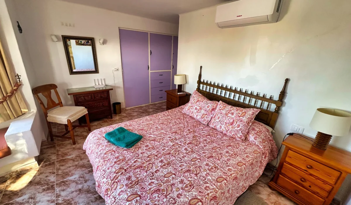 Bedroom 2 with double bed, air conditioning and en-suite bathroom