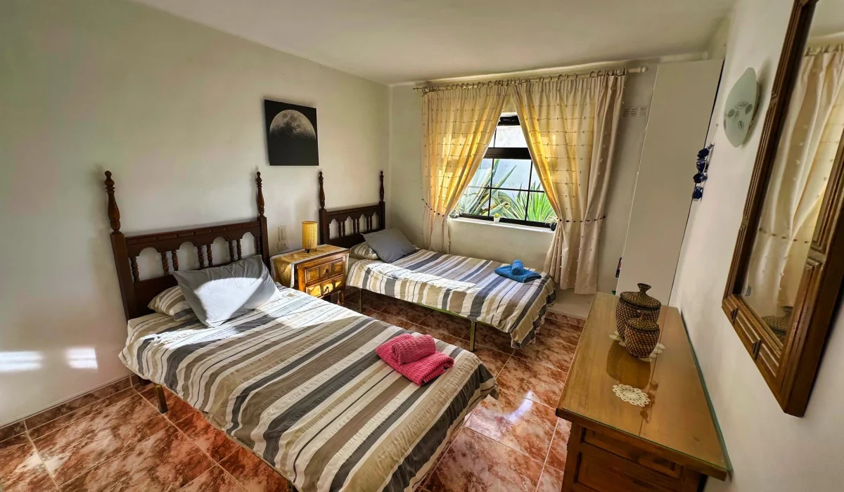 Bedroom 3 with two single beds